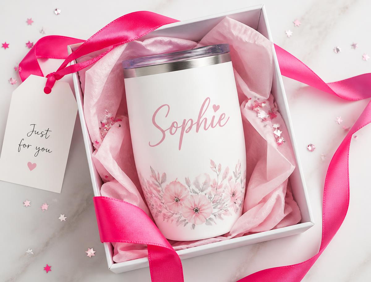 Gift-boxed personalised cup with pink ribbon, tissue paper and a gift tag